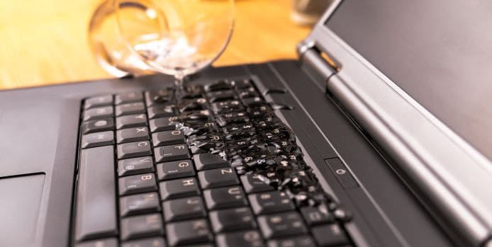 Water spill on laptop